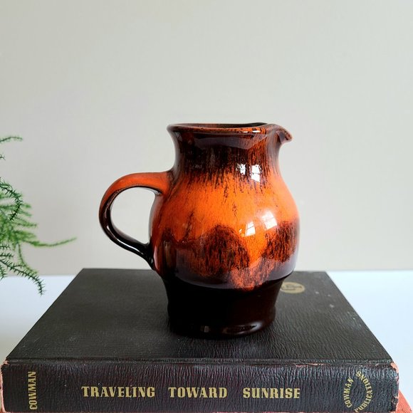 Orange/red ceramic pitcher/creamer. - Picture 3 of 6